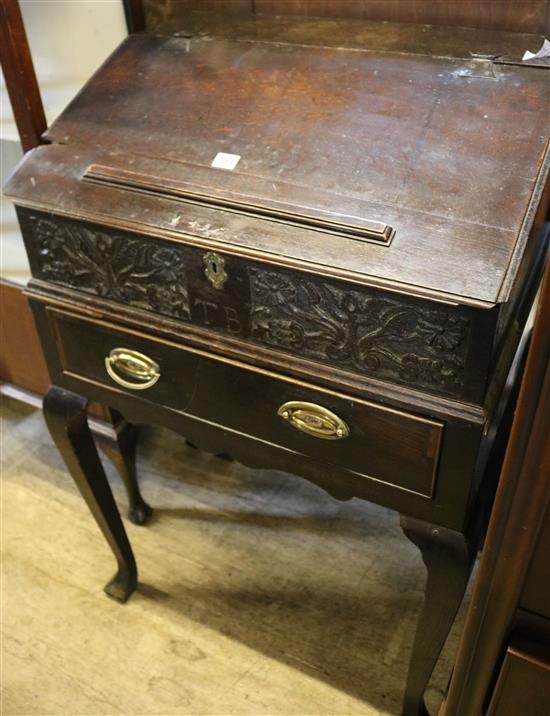 A mid 18th century oak bureau (adapted)